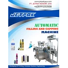 AUTOMATIC FILLING AND CAPPING MACHINE - Mesin Pengisian/Penutup 1